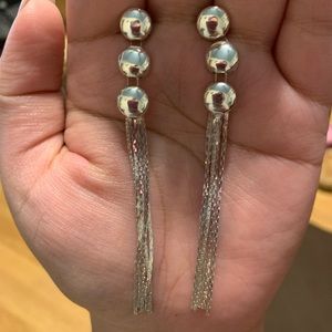 Woman’s long earrings